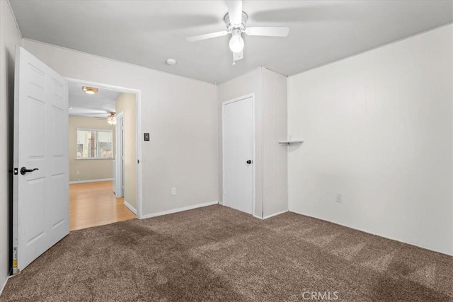 1869 Thrush Rd, Wrightwood, CA 92397 - unfurnished bedroom featuring carpet flooring and a ceiling fan