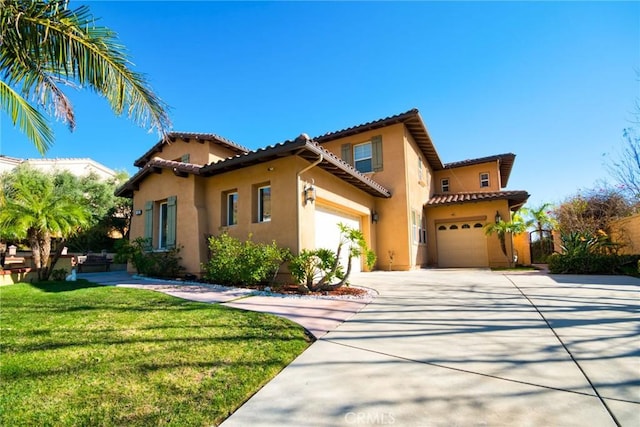 1482 Fergus, Claremont, CA 91711 - view of front facade with stucco siding, driveway, a front yard, a tiled roof, and a garage