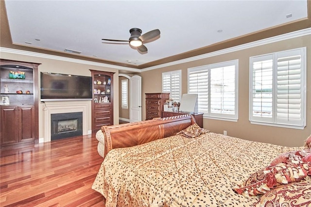 1482 Fergus, Claremont, CA 91711 - bedroom featuring wood finished floors, a fireplace, ornamental molding, and ceiling fan