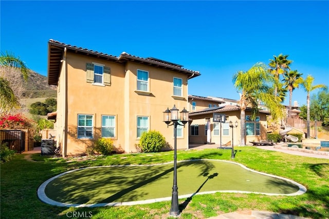 1482 Fergus, Claremont, CA 91711 - back of house with a putting area and stucco siding