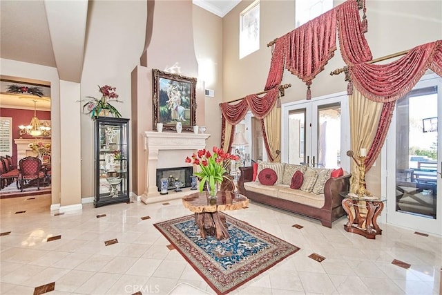 1482 Fergus, Claremont, CA 91711 - tiled living room with plenty of natural light, a chandelier, a high ceiling, a fireplace with raised hearth, and french doors