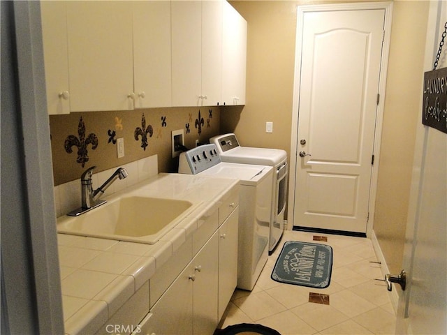 1482 Fergus, Claremont, CA 91711 - laundry room with washing machine and dryer, cabinet space, and light tile patterned flooring