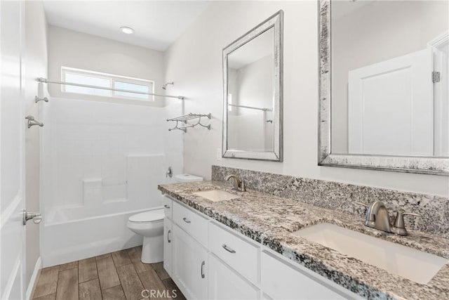 9121 6th Ave, Hesperia, CA 92345 - full bathroom featuring double vanity, tub / shower combination, and wood finish floors