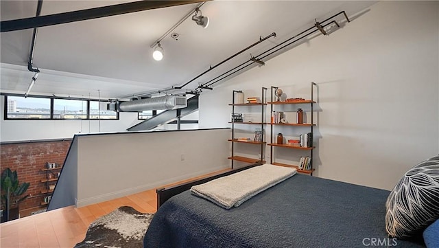 120 S Hewitt St Unit 11, Los Angeles, CA 90012 - bedroom featuring wood finished floors and baseboards