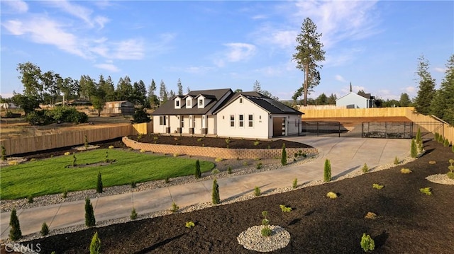 5500 Harrison Rd, Paradise, CA 95969 - rear view of property featuring solar panels, a gate, and stucco siding