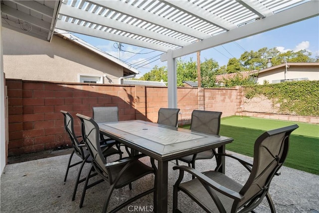 1541 E Wellington Ave, Santa Ana, CA 92701 - fenced backyard featuring outdoor dining area, a putting green, a pergola, and a patio