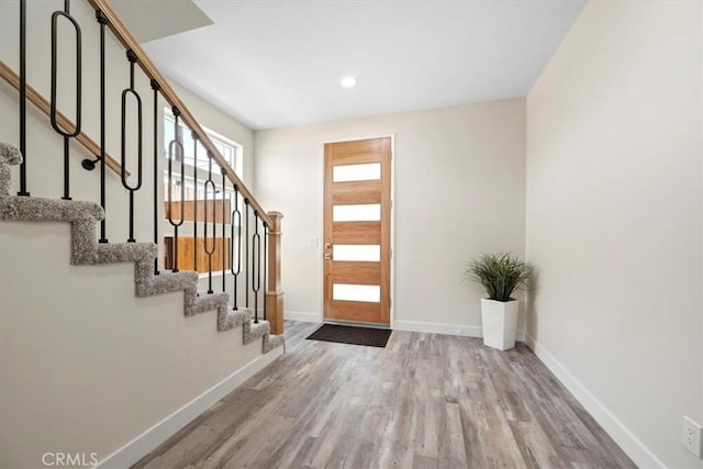 1296 Saratoga Ave, Grover Beach, CA 93433 - entrance foyer with wood finished floors, stairs, and recessed lighting