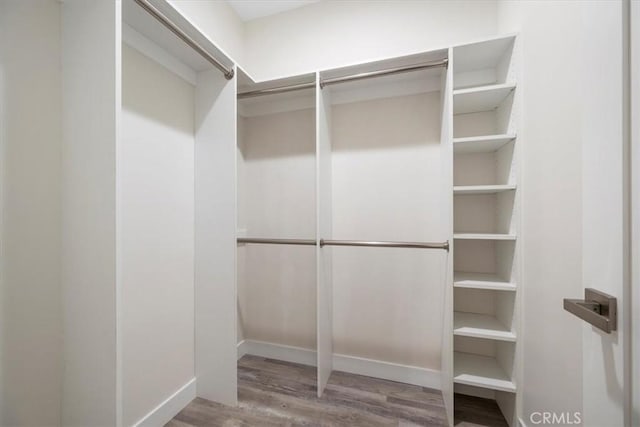 1296 Saratoga Ave, Grover Beach, CA 93433 - spacious closet featuring wood finished floors