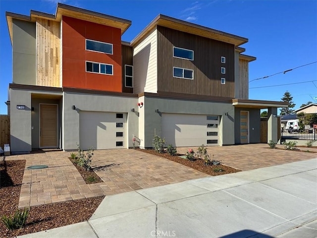 1296 Saratoga Ave, Grover Beach, CA 93433 - contemporary house with a garage and decorative driveway