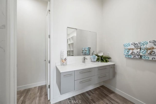 1296 Saratoga Ave, Grover Beach, CA 93433 - bathroom featuring wood finished floors and vanity