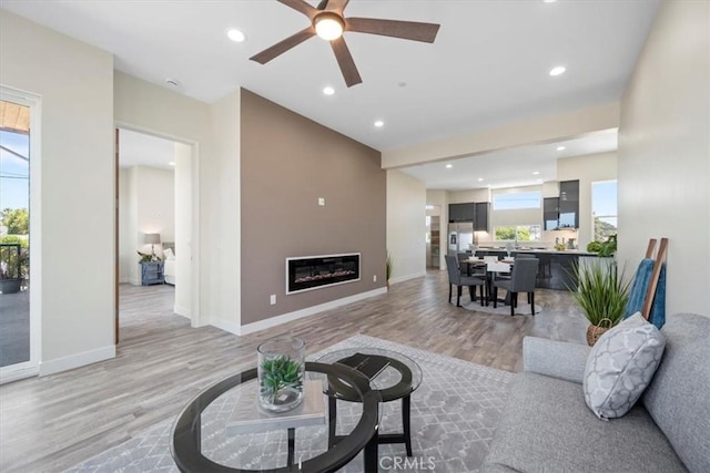 1296 Saratoga Ave, Grover Beach, CA 93433 - living area with light wood-style floors, healthy amount of natural light, recessed lighting, and ceiling fan