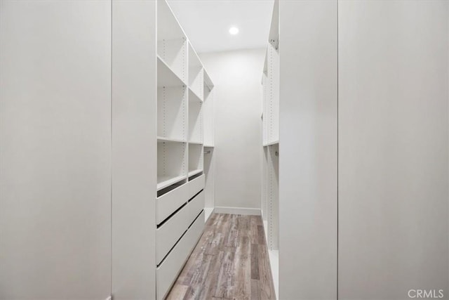 1296 Saratoga Ave, Grover Beach, CA 93433 - walk in closet with light wood-style flooring