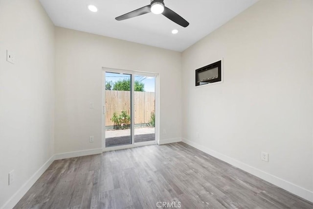1296 Saratoga Ave, Grover Beach, CA 93433 - empty room with wood finished floors, a ceiling fan, and recessed lighting