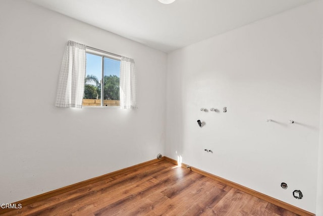 236 S 11th St, Santa Paula, CA 93060 - empty room with wood finished floors and baseboards