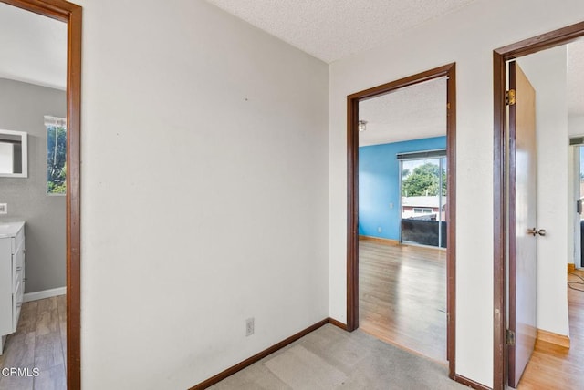 236 S 11th St, Santa Paula, CA 93060 - hall with a textured ceiling and light wood finished floors