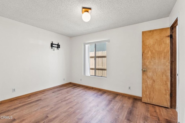 236 S 11th St, Santa Paula, CA 93060 - spare room featuring wood finished floors and a textured ceiling