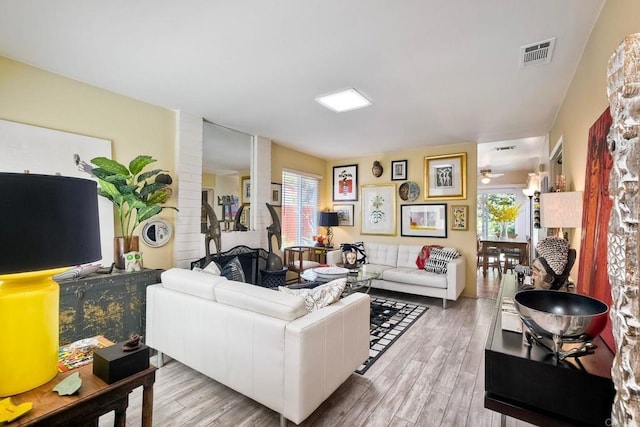6548 Camino Del Parque, Carlsbad, CA 92011 - living room with plenty of natural light, light wood finished floors, and ceiling fan