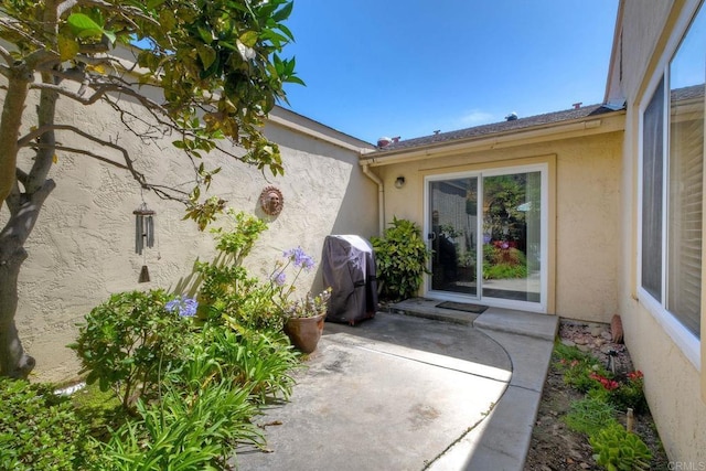 6548 Camino Del Parque, Carlsbad, CA 92011 - property entrance featuring stucco siding and a patio area