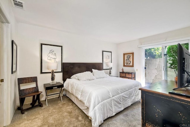 6548 Camino Del Parque, Carlsbad, CA 92011 - bedroom featuring access to outside and light colored carpet