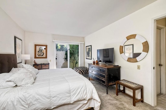 6548 Camino Del Parque, Carlsbad, CA 92011 - bedroom featuring access to exterior and light colored carpet