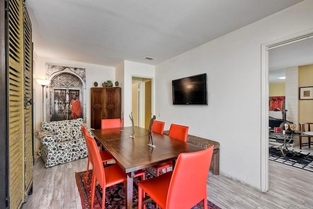 6548 Camino Del Parque, Carlsbad, CA 92011 - dining room with light wood finished floors