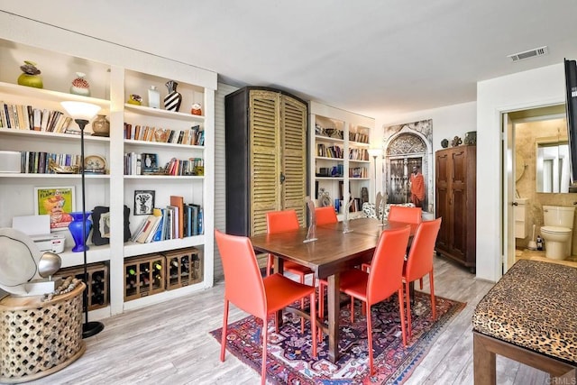 6548 Camino Del Parque, Carlsbad, CA 92011 - dining space featuring light wood-style flooring