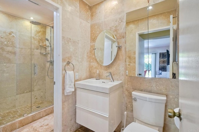 6548 Camino Del Parque, Carlsbad, CA 92011 - bathroom featuring tile walls, vanity, and a stall shower
