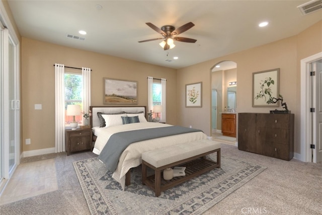 1910 Crandall Way, Paradise, CA 95969 - bedroom featuring arched walkways, light carpet, ceiling fan, ensuite bathroom, and recessed lighting
