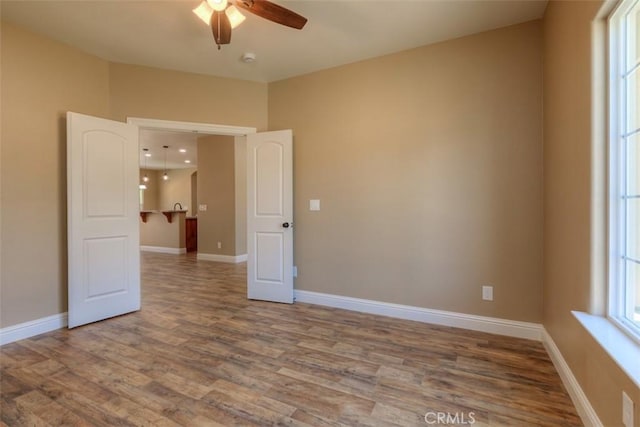 1910 Crandall Way, Paradise, CA 95969 - empty room with ceiling fan, wood finished floors, and a smoke detector