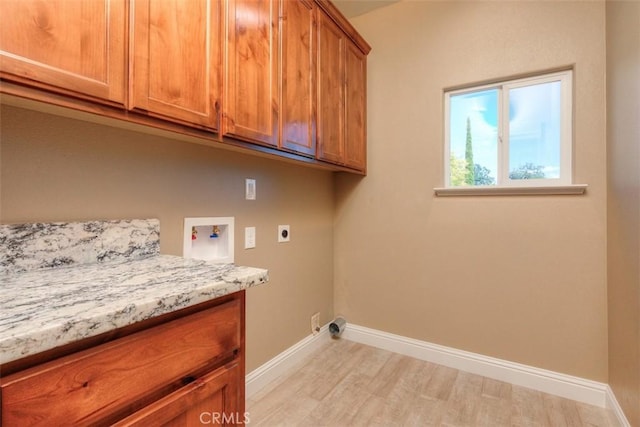 1910 Crandall Way, Paradise, CA 95969 - laundry room with cabinet space, hookup for an electric dryer, washer hookup, and light wood finished floors
