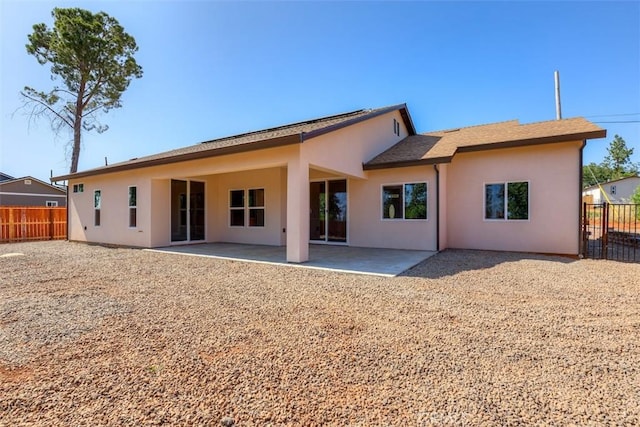 1910 Crandall Way, Paradise, CA 95969 - back of house featuring stucco siding and a patio