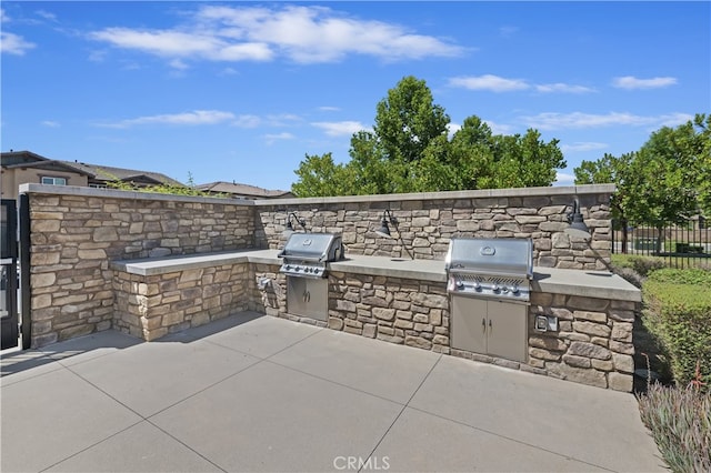 24329 Red Spruce Ave, Murrieta, CA 92562 - view of patio / terrace featuring exterior kitchen