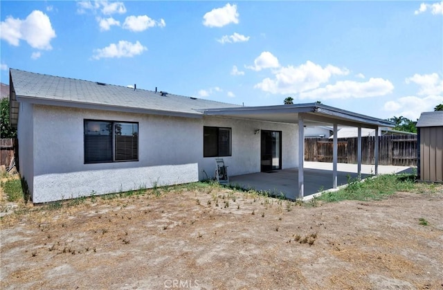 444 Westminister Dr, San Jacinto, CA 92583 - rear view of property with a patio area and stucco siding