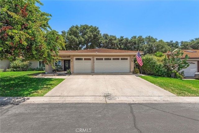 28536 Paseo Diana, San Juan Capistrano, CA 92675 - single story home featuring a tiled roof, a front lawn, a garage, concrete driveway, and stucco siding