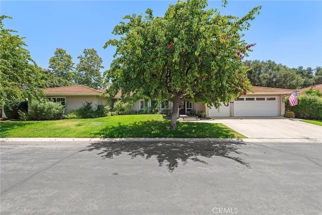28536 Paseo Diana, San Juan Capistrano, CA 92675 - view of front of house with a tiled roof, a garage, concrete driveway, and stucco siding