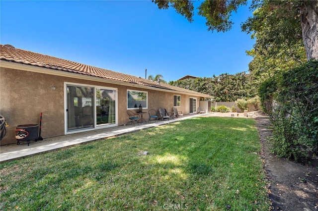 28536 Paseo Diana, San Juan Capistrano, CA 92675 - rear view of property featuring stucco siding, a fenced backyard, a patio, and a tile roof