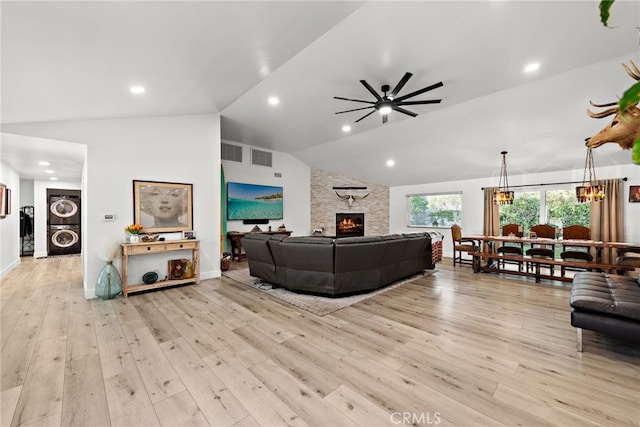 28536 Paseo Diana, San Juan Capistrano, CA 92675 - living room with lofted ceiling, ceiling fan, a stone fireplace, light wood finished floors, and recessed lighting