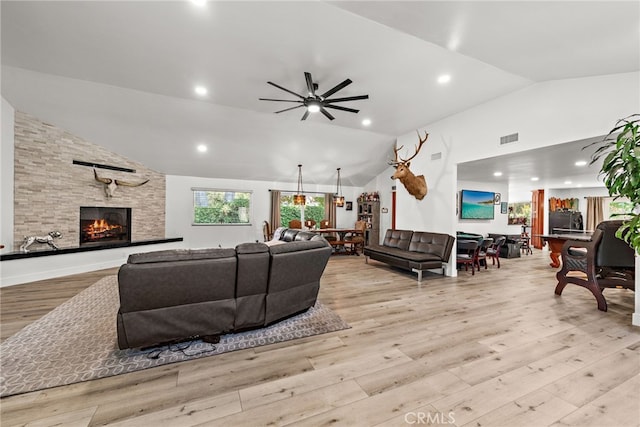 28536 Paseo Diana, San Juan Capistrano, CA 92675 - living room with lofted ceiling, ceiling fan, a stone fireplace, wood finished floors, and recessed lighting