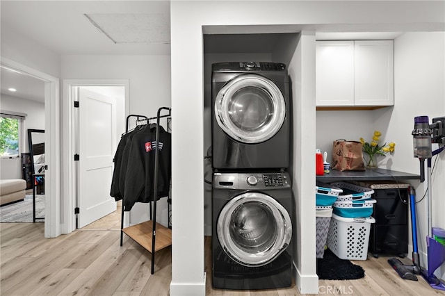 28536 Paseo Diana, San Juan Capistrano, CA 92675 - laundry area with stacked washer and clothes dryer and light wood-style flooring