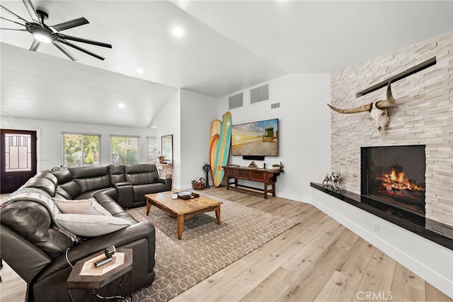28536 Paseo Diana, San Juan Capistrano, CA 92675 - living area featuring vaulted ceiling, light wood-style flooring, a stone fireplace, recessed lighting, and ceiling fan
