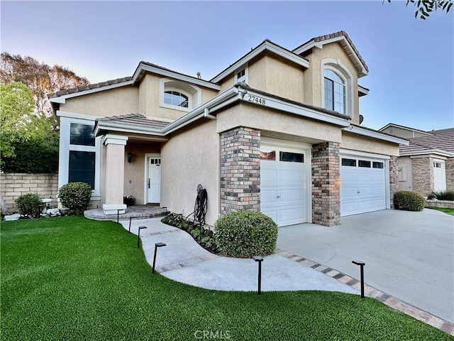 27448 Bridgewater Dr, Valencia, CA 91354 - traditional-style house featuring stucco siding, a front lawn, a garage, and concrete driveway