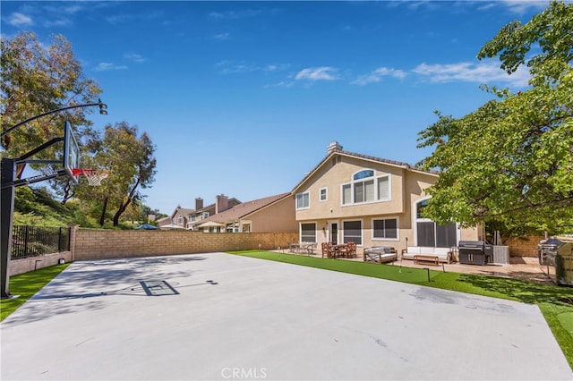 27448 Bridgewater Dr, Valencia, CA 91354 - view of basketball court featuring a fenced backyard and basketball court