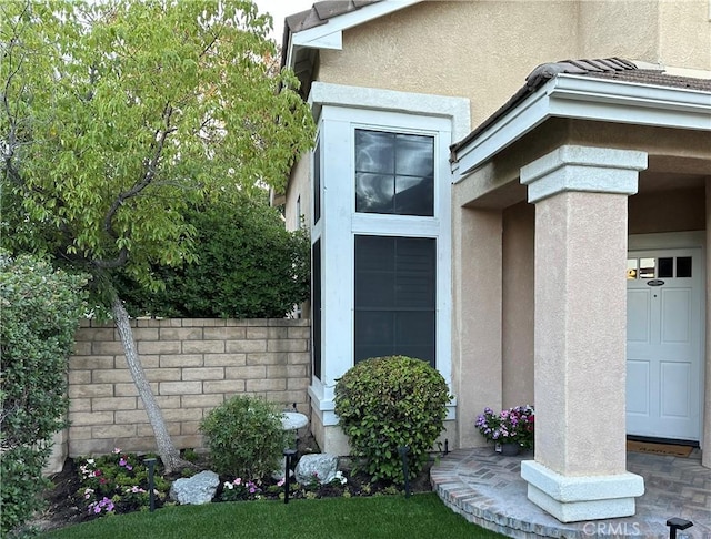 27448 Bridgewater Dr, Valencia, CA 91354 - doorway to property with stucco siding