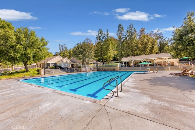 27448 Bridgewater Dr, Valencia, CA 91354 - community pool with a patio and view of scattered trees