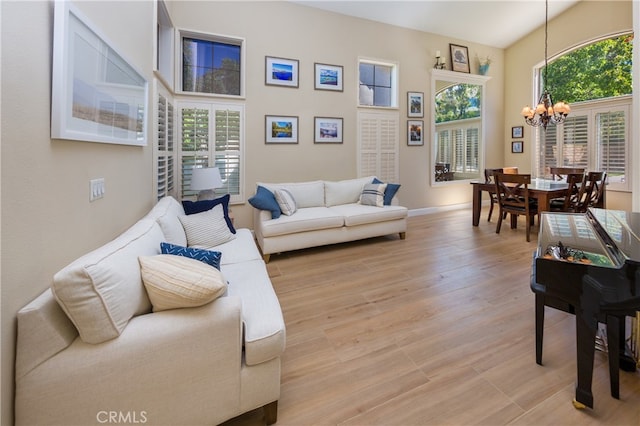 27448 Bridgewater Dr, Valencia, CA 91354 - living room with a chandelier and light wood-style floors