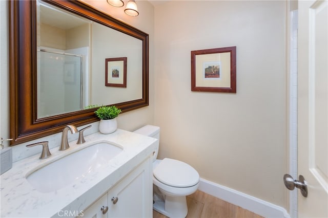27448 Bridgewater Dr, Valencia, CA 91354 - bathroom with vanity, an enclosed shower, and wood finished floors