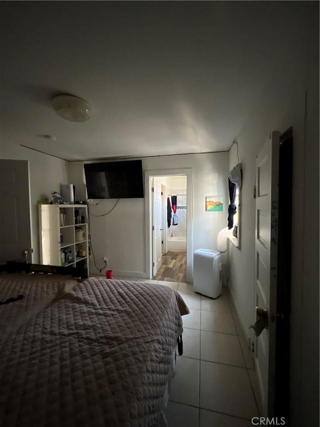 1248 Rolland Curtis Pl, Los Angeles, CA 90037 - view of tiled bedroom
