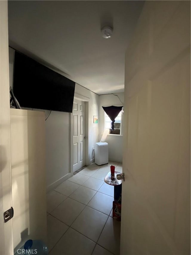 1248 Rolland Curtis Pl, Los Angeles, CA 90037 - bedroom featuring light tile patterned flooring