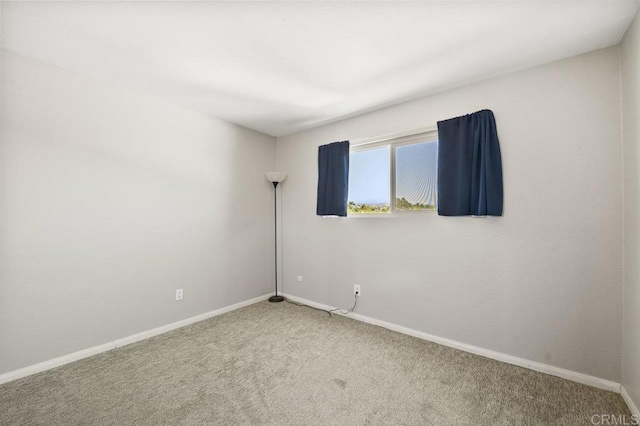 1240 N Broadway Unit 30, Escondido, CA 92026 - spare room featuring carpet flooring and baseboards