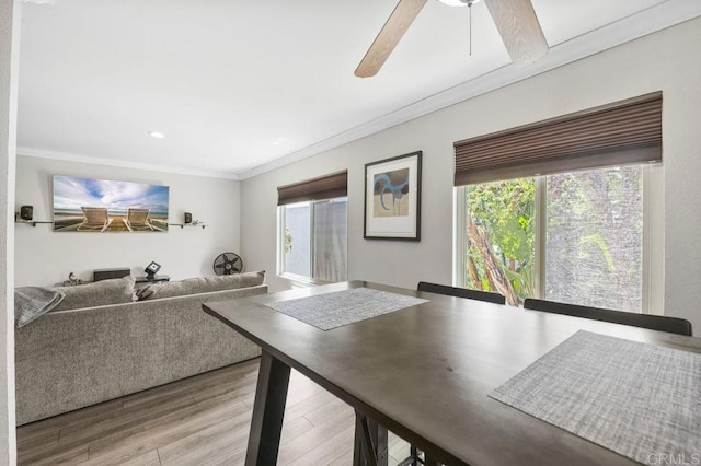 1240 N Broadway Unit 30, Escondido, CA 92026 - unfurnished dining area featuring crown molding, wood finished floors, and a ceiling fan